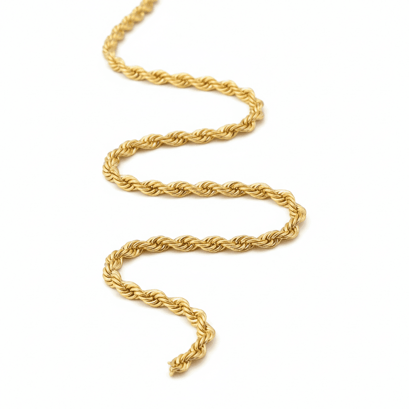 Classic gold plated rope chain necklace on white background